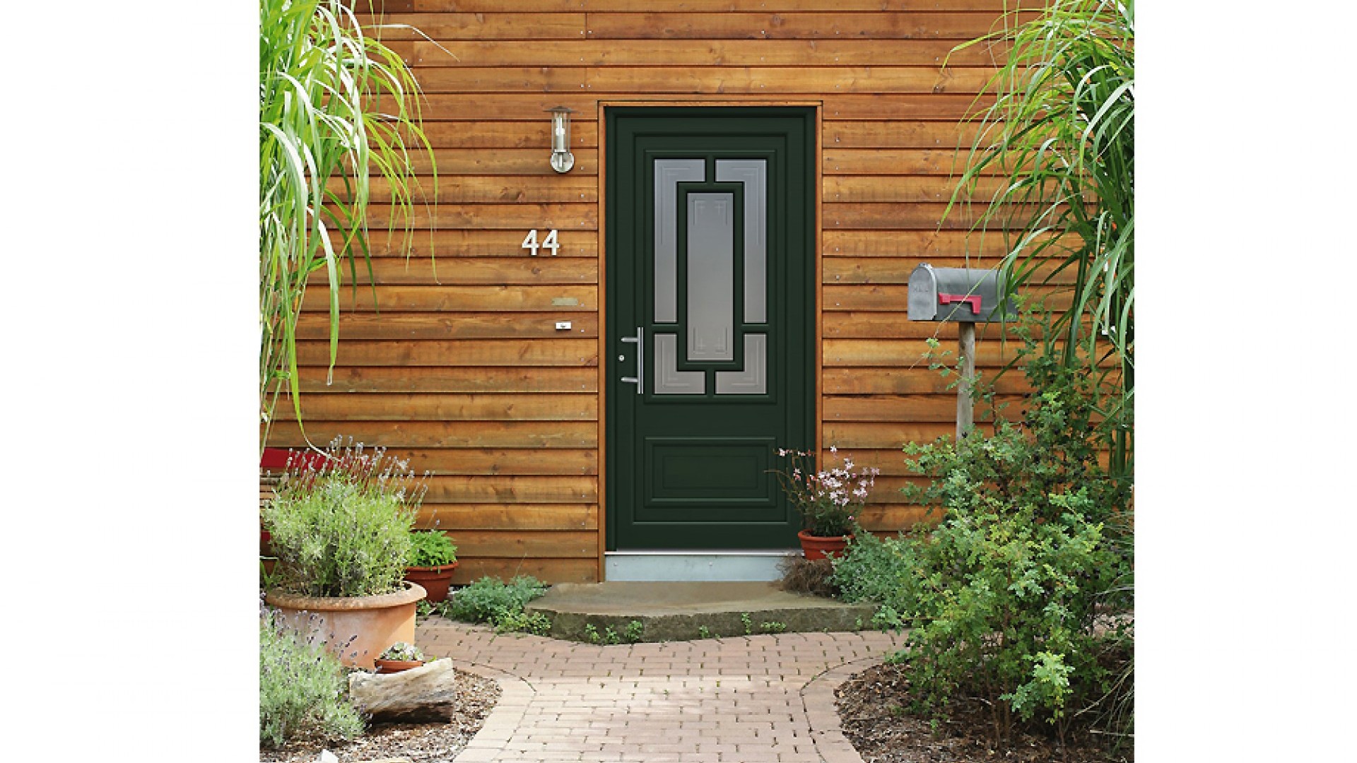 Geradlinige Haustür in Grün aus Holz mit Glas